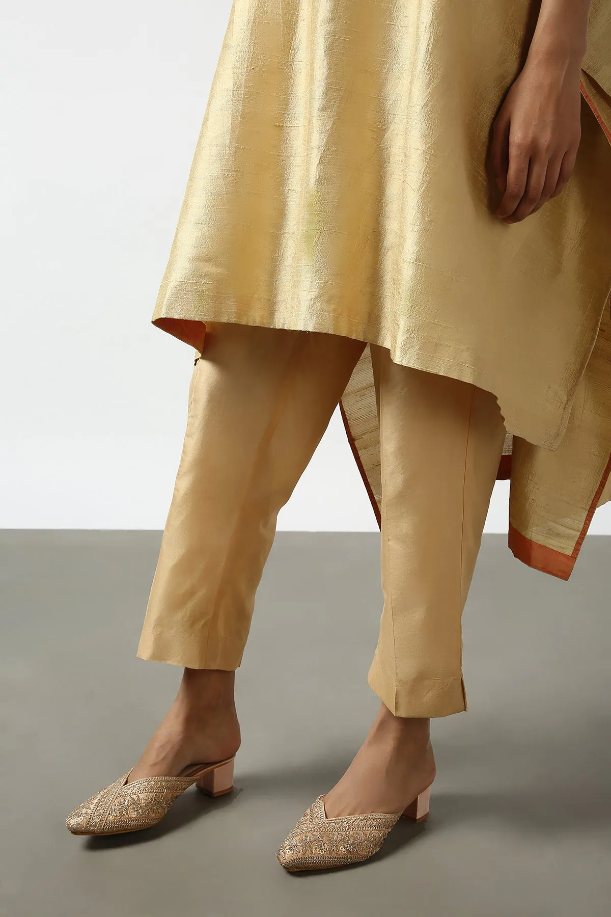 Gold Raw Silk Top with Mirror Work Yoke. Tussar Pant or M. Giri Pant.